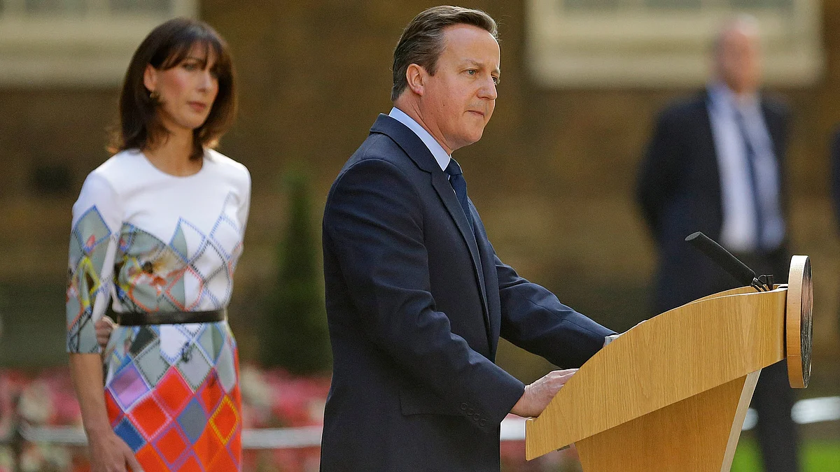 Britain’s Prime Minister David Cameron speaks outside 10 Downing Street, London as his wife Samantha looks on, Friday, 24 June 2016. (Photo: AP)