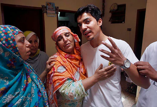 Zeenat Rafiq’s husband at his home in Lahore. (Photo: AP)
