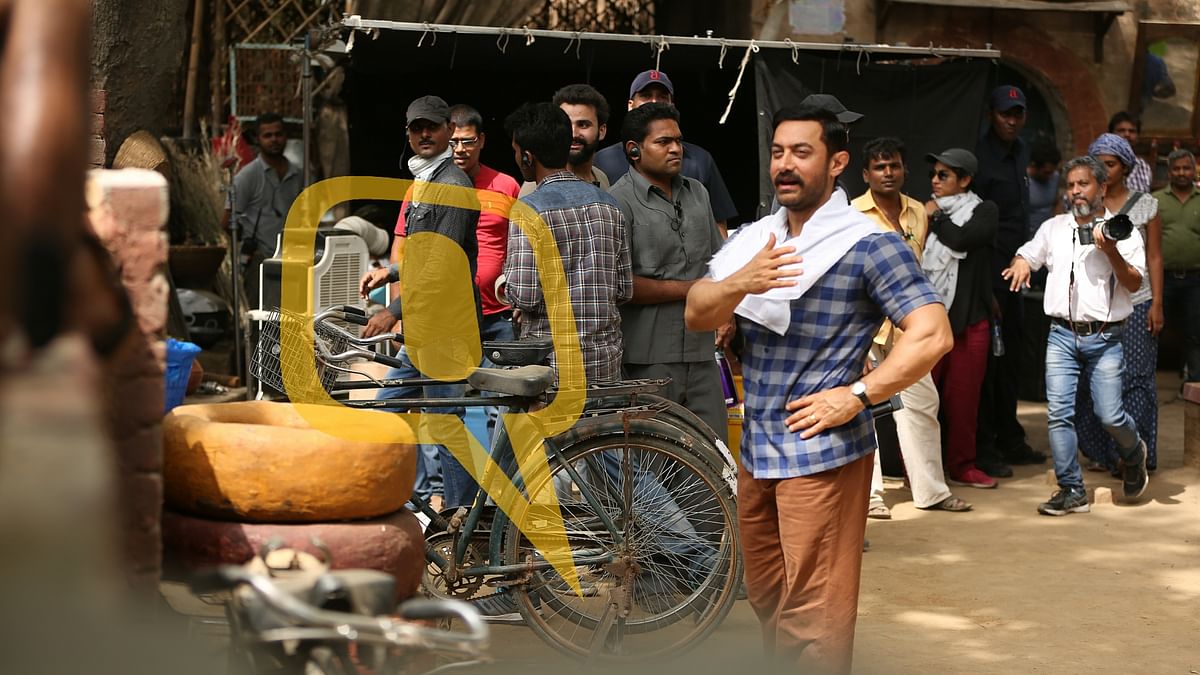 Catch Aamir Khan at his beefy best on the sets of ‘Dangal’, after putting on 95 kgs last year for the movie.