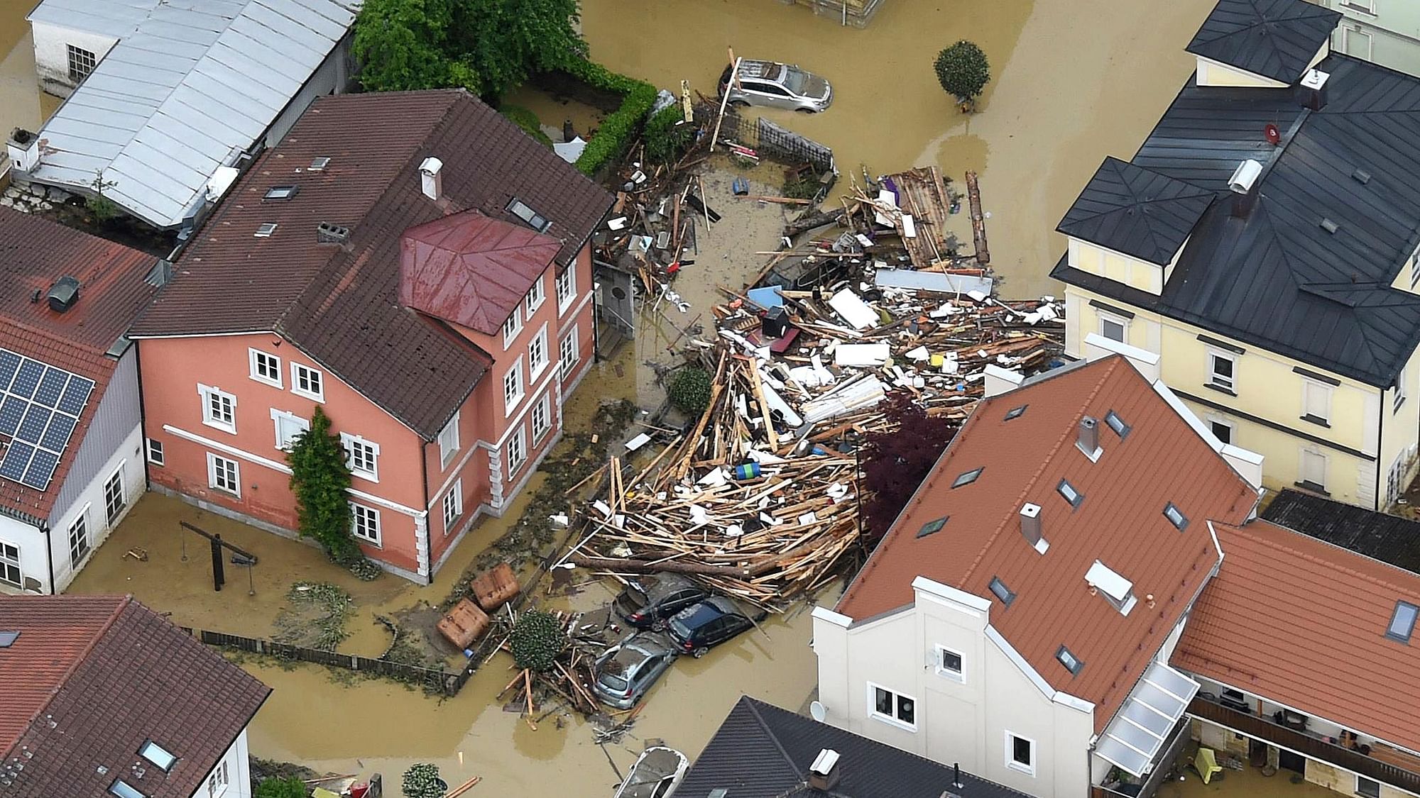  An aerial view shows the flooded streets and damages in Simbach am Inn, southern Germany, Thursday 2 June 2016. Several people died when the small town was hit by heavy flooding the day before. ( Photo: AP/Tobias Hase/dpa)
