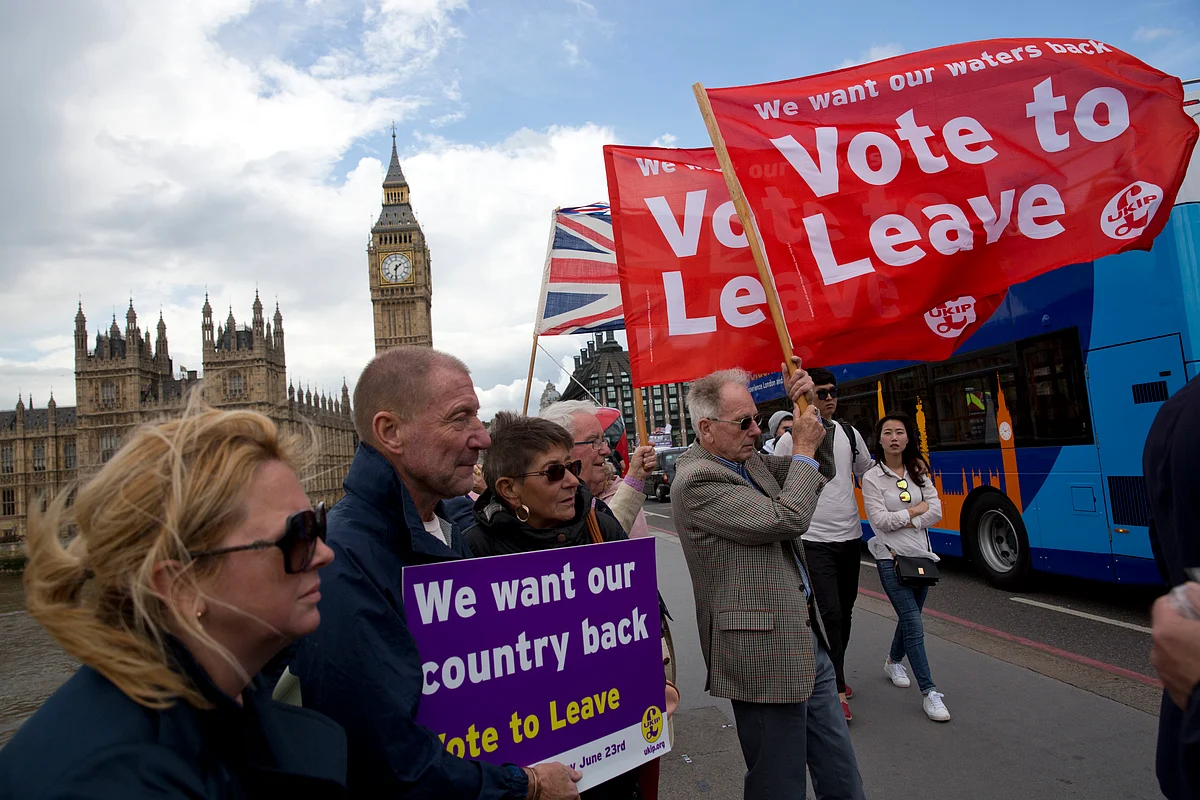 Leave supporters hold banners and flags as they stand on Westminster Bridge during an EU referendum campaign. Image used for representation purpose. (Photo: AP)