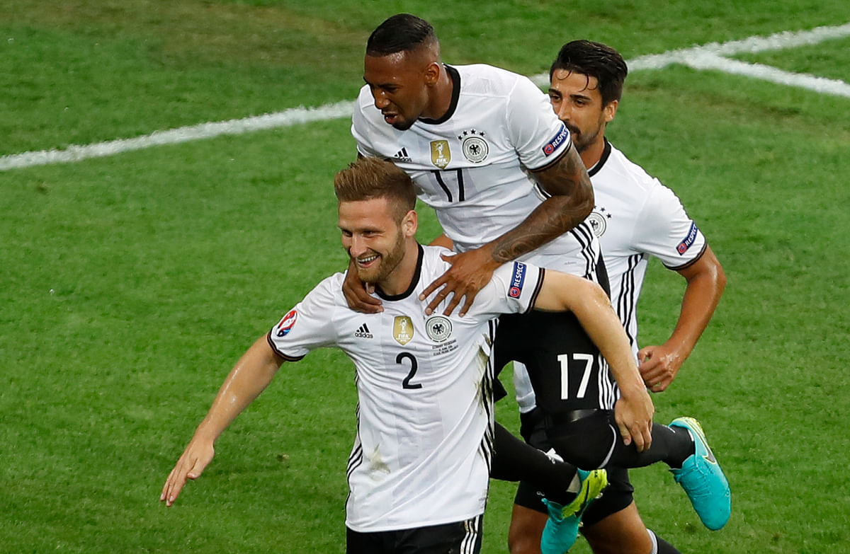 Bastian Schweinsteiger marked his return from injury by sealing a 2-0 win for Germany over Ukraine.