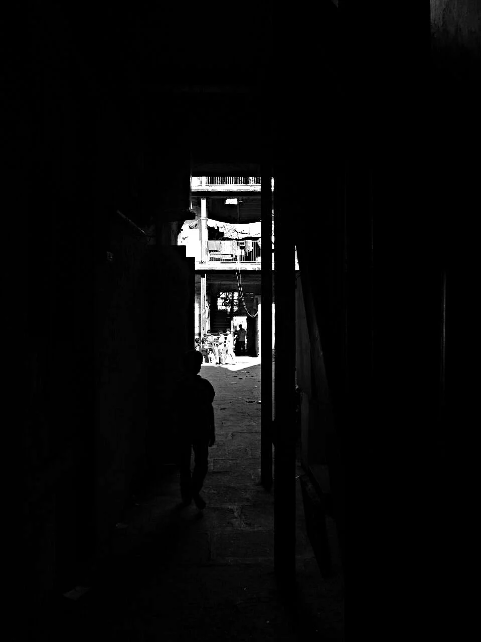 A boy running out to a sunny world, out of the shadows of his home. Although attached to the protection of the shadows, he is also raring for the heat on his skin. (Photo: <b>The Quint</b>/Maanvi)