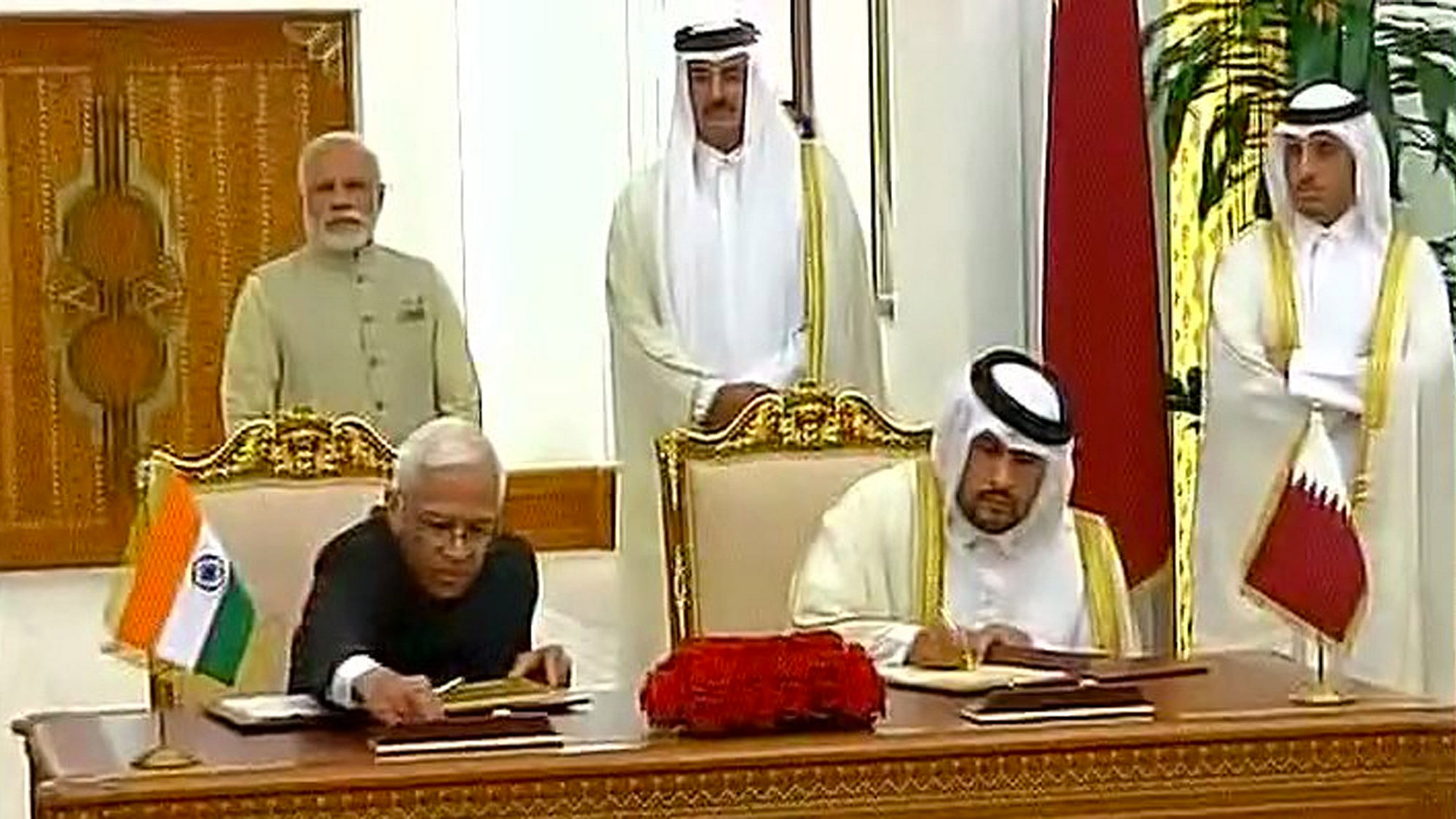 Prime Minister Narendra Modi and Qatar Emir Tamim Bin Hamad Al Thani on Sunday witnessed the signing of agreements in Doha. (Photo Courtesy: <a href="https://twitter.com/MEAIndia">Twitter/Vikas Swarup</a>)