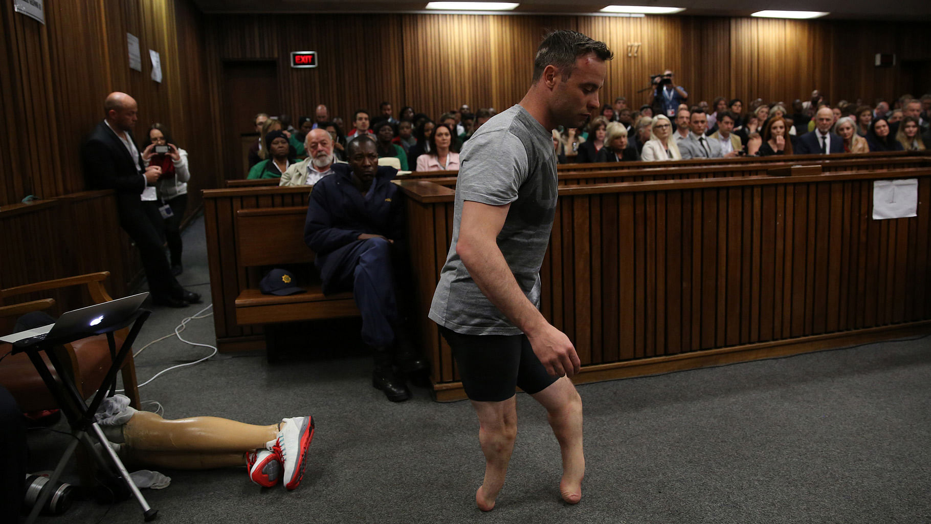 Oscar Pistorius’ prosthetics lay on the floor as he walked on his stumps during argument in mitigation of sentence by his defence attorney Barry Roux in the High Court in Pretoria, South Africa, 15 June  2016. (Photo: AP)