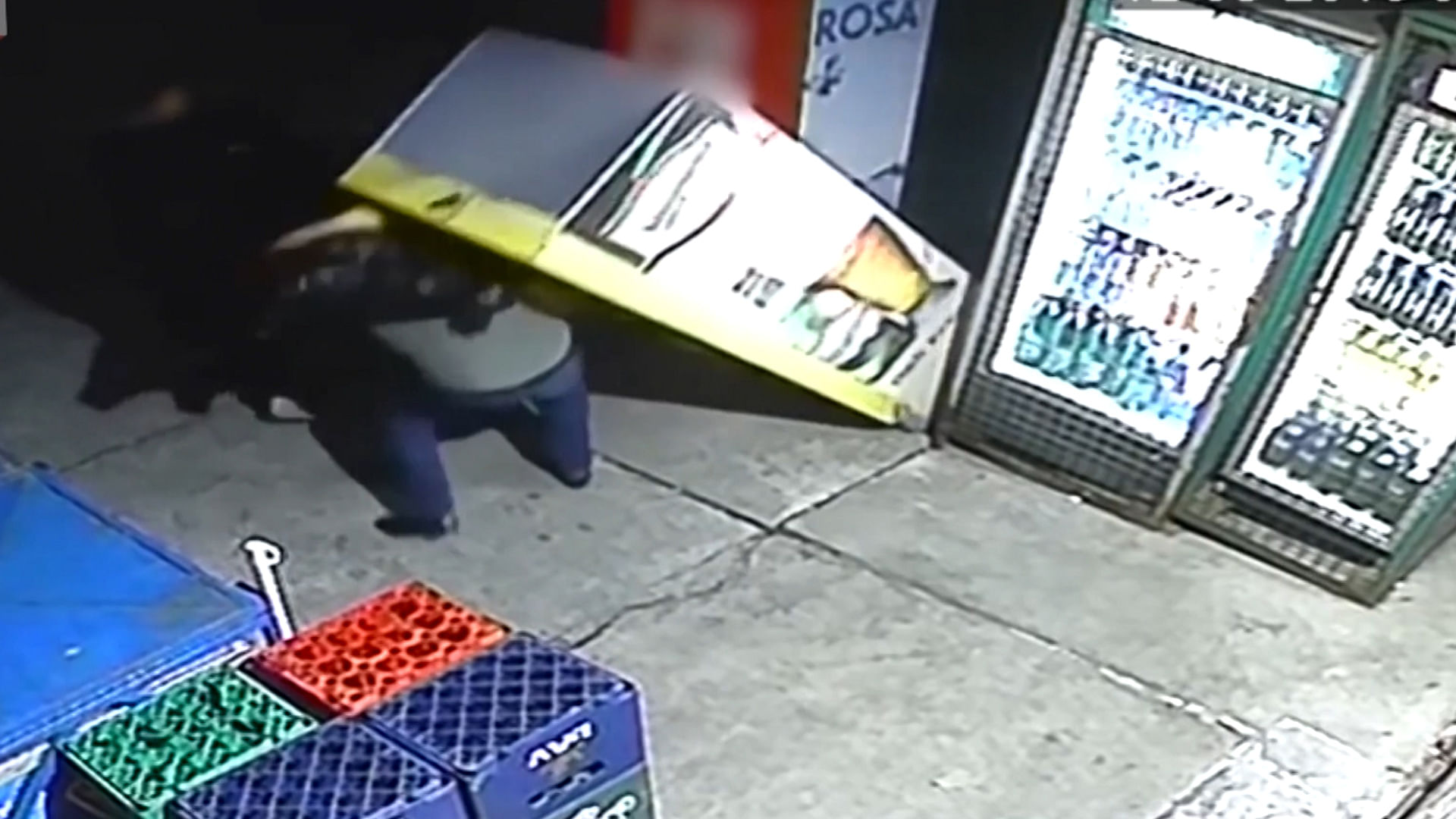 The fridge toppled down on the thief as he tried to steal beer. (Photo: AP/Jukin Media Screengrab)