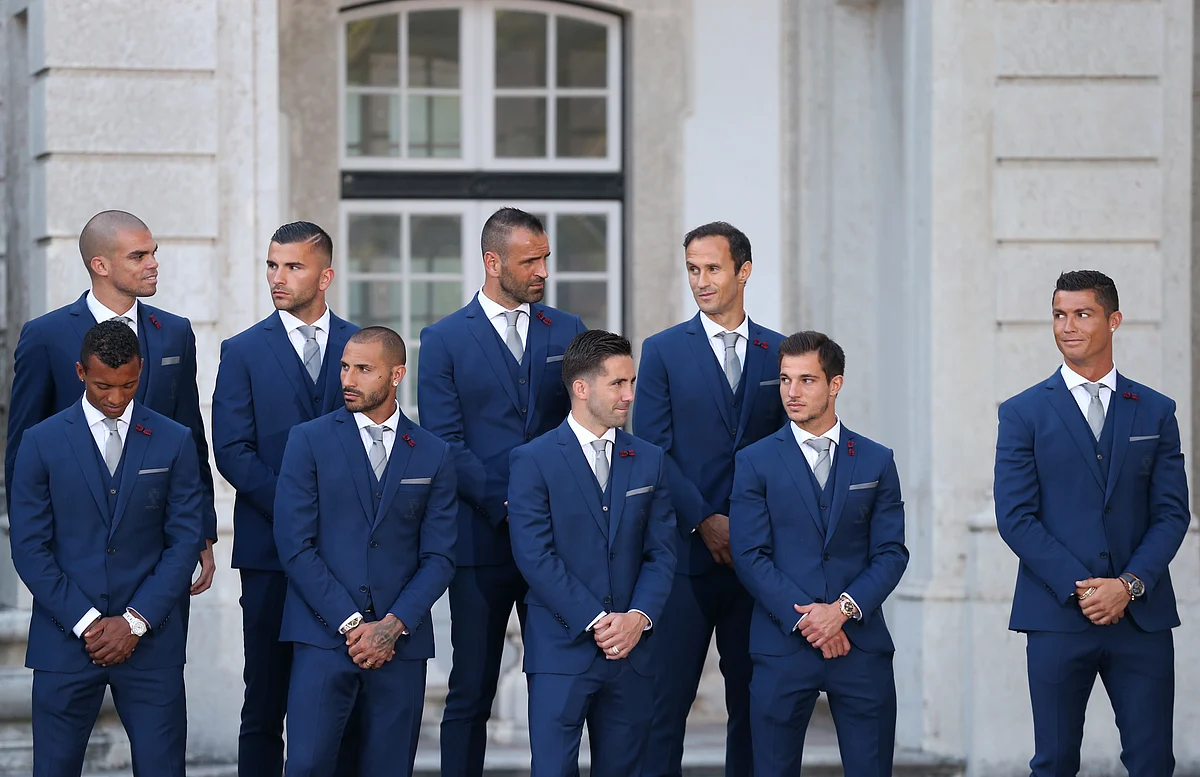 Team captain Cristiano Ronaldo, (right), looks at his teammates while listening to Portuguese President Marcelo Rebelo de Sousa at the Belem presidential palace in Lisbon. (Photo: AP)