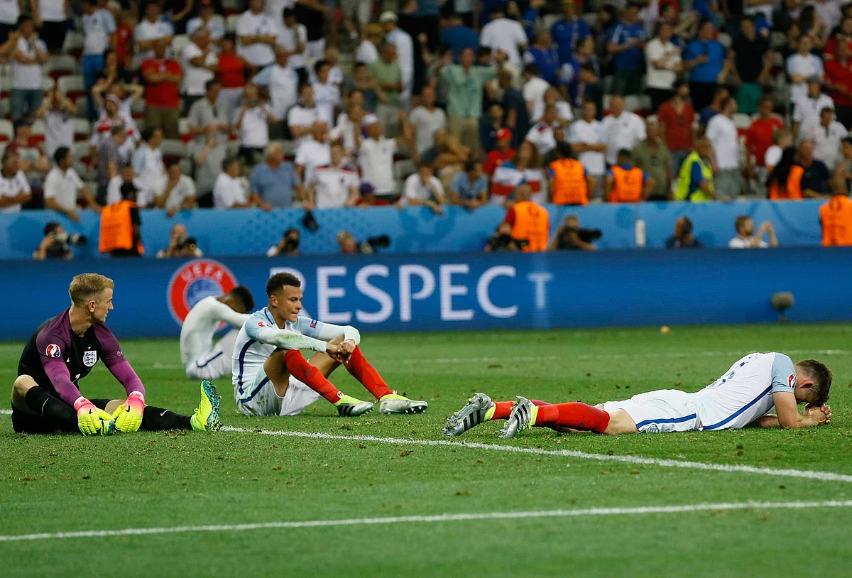 England players react at the end of the Euro 2016 round of 16 match between England and Iceland. (Photo: AP)