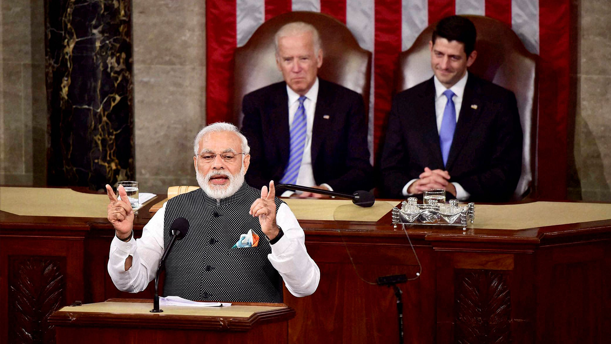 

Prime Minister Narendra Modi gestures while addressing a joint meeting of Congress on Capitol Hill in Washington on Wednesday. Vice President Joe Biden and House Speaker Paul D. Ryan are seen at the behind. (Photo: PTI)