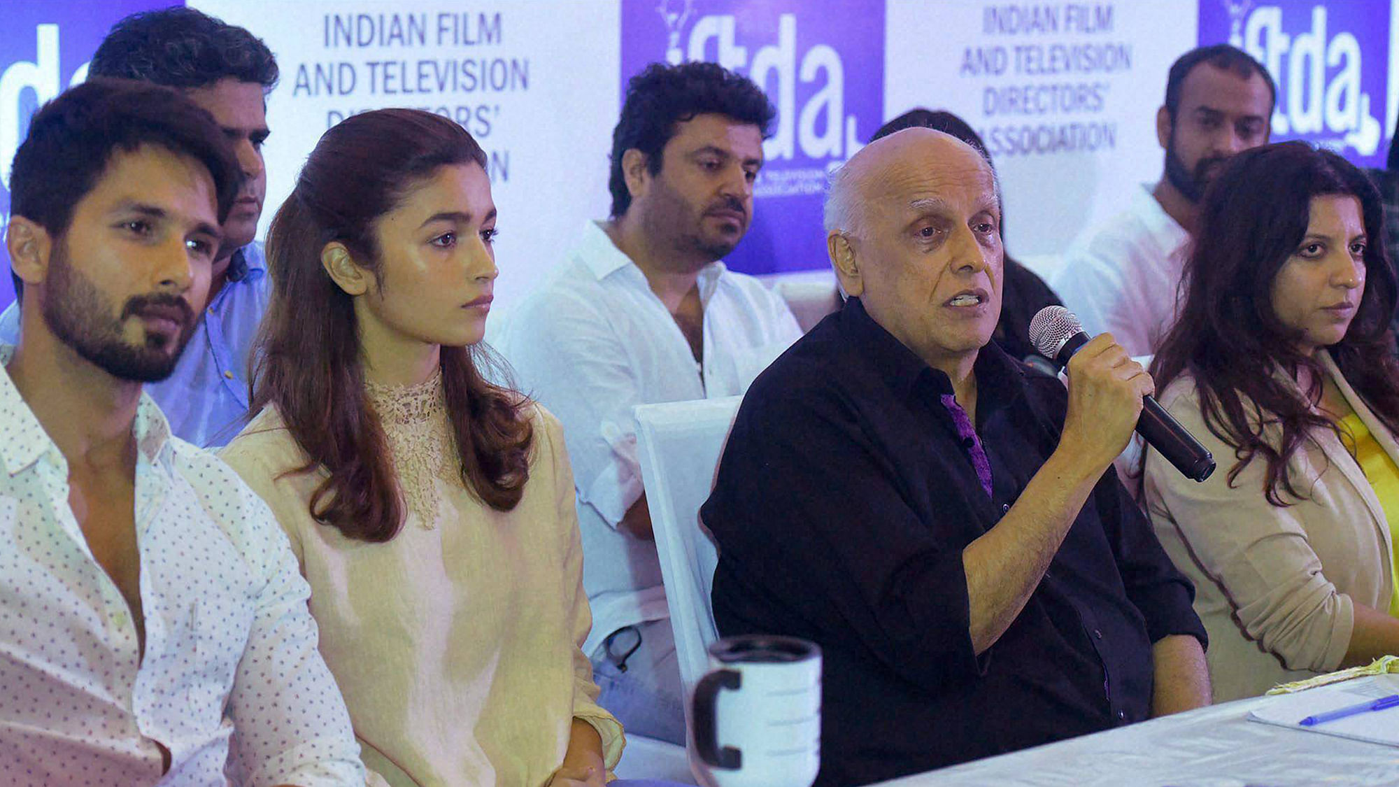 Filmmaker Mahesh Bhatt with Udta Punjab film actors Shahid Kapoor and Alia Bhatt speaks at a press conference organized by Indian Film and Television Directors Association (IFTDA) in Mumbai on Wednesday. (Photo: PTI)