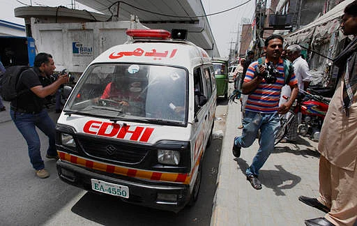 Ambulance transporting the body of Zeenat Rafiq, who was burned alive allegedly by her mother. (Photo: AP)