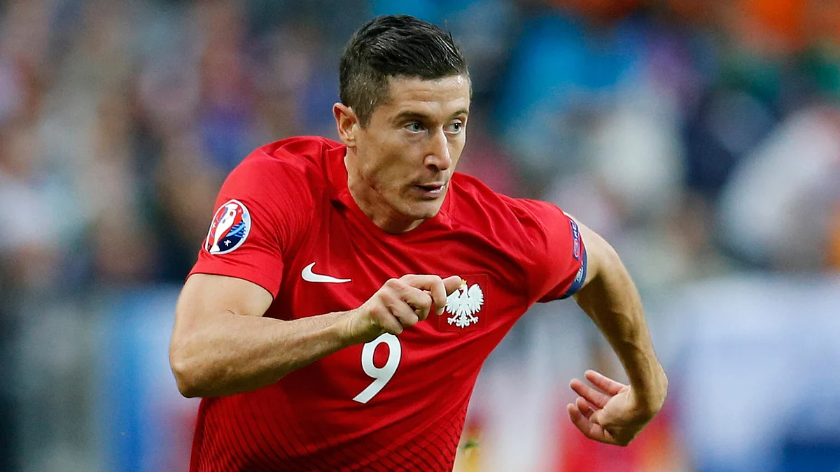 Poland’s Robert Lewandowski runs with the ball during the match against Germany. (Photo: AP) 
