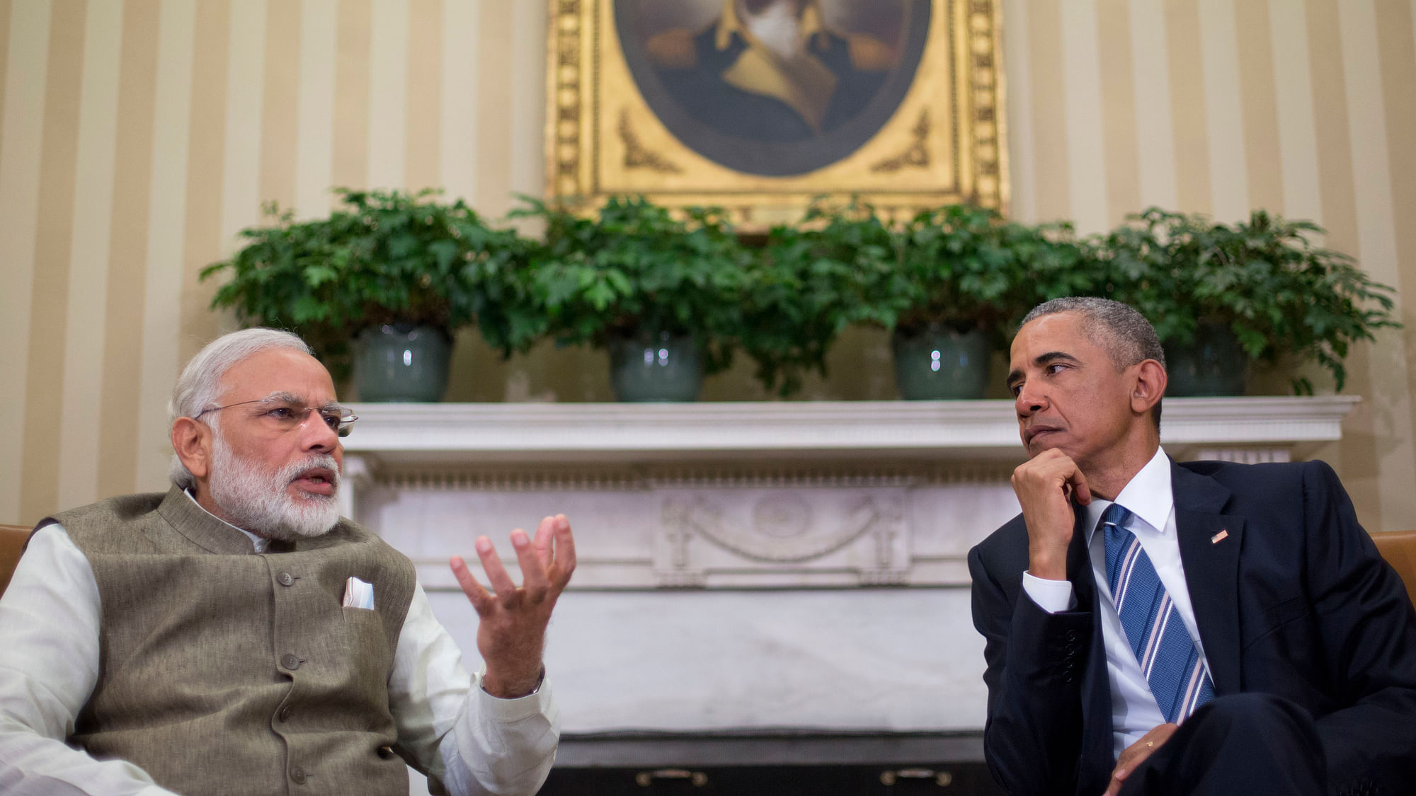 US President Barack Obama listens as Indian Prime Minister Narendra Modi speaks to members of the media. (Photo: AP)