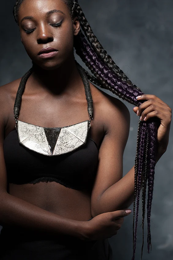 African woman with long braided hair. (Photo: iStockphoto)