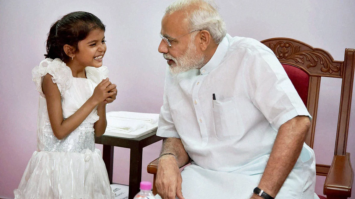Prime Minister Narendra Modi interacts with Vaishali whose heart surgery was funded by the PMO after she wrote to him seeking help, in Pune, June 26, 2016. (Photo: PTI)