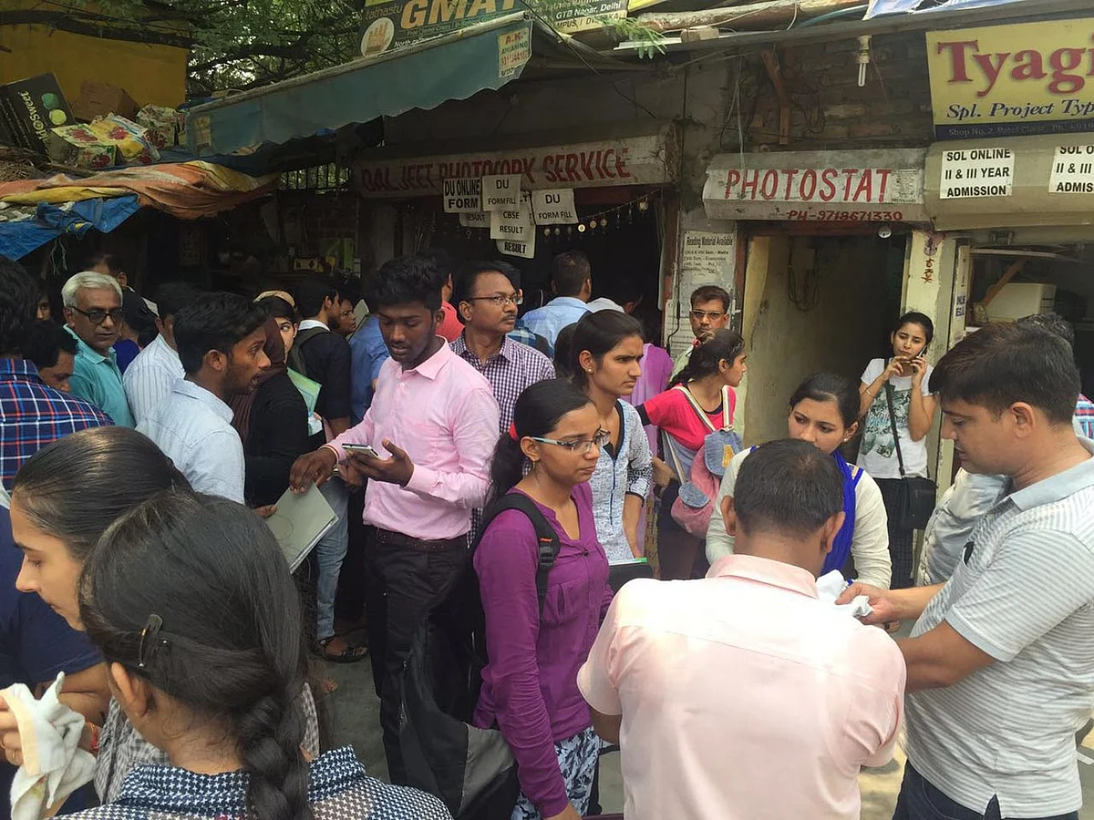 Students stand around the Ramjas College in Delhi on thursday, 30 June 2016. (Photo: <b>The Quint</b>)