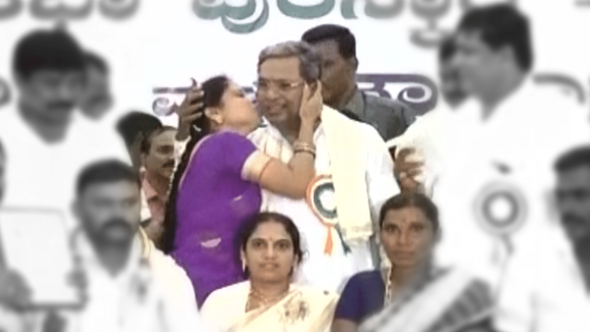 Karnataka Chief Minister Siddaramaiah and local leader Girija Srinivas. (Photo: ANI Screengrab)