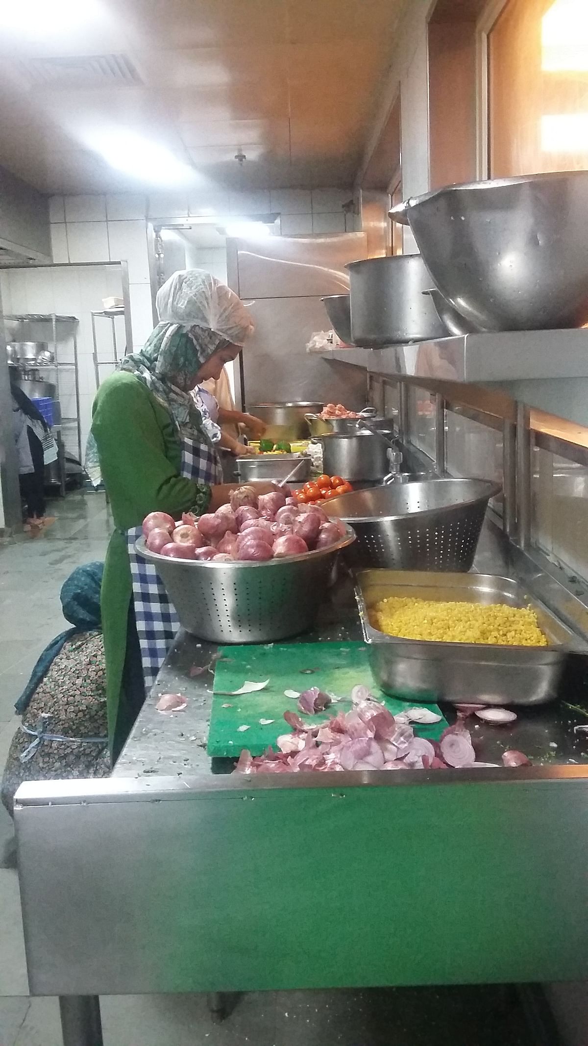 Far from the horrors of war back home, seven Afghan women refugees are serving up delicious fare in India.