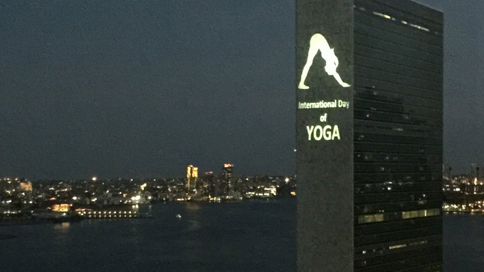 UN Headquarters in New York city set to light up with Yoga posture projections. (Photo Courtesy: <a href="https://twitter.com/akbaruddinindia">Syed Akbarudding/Twitter</a>)