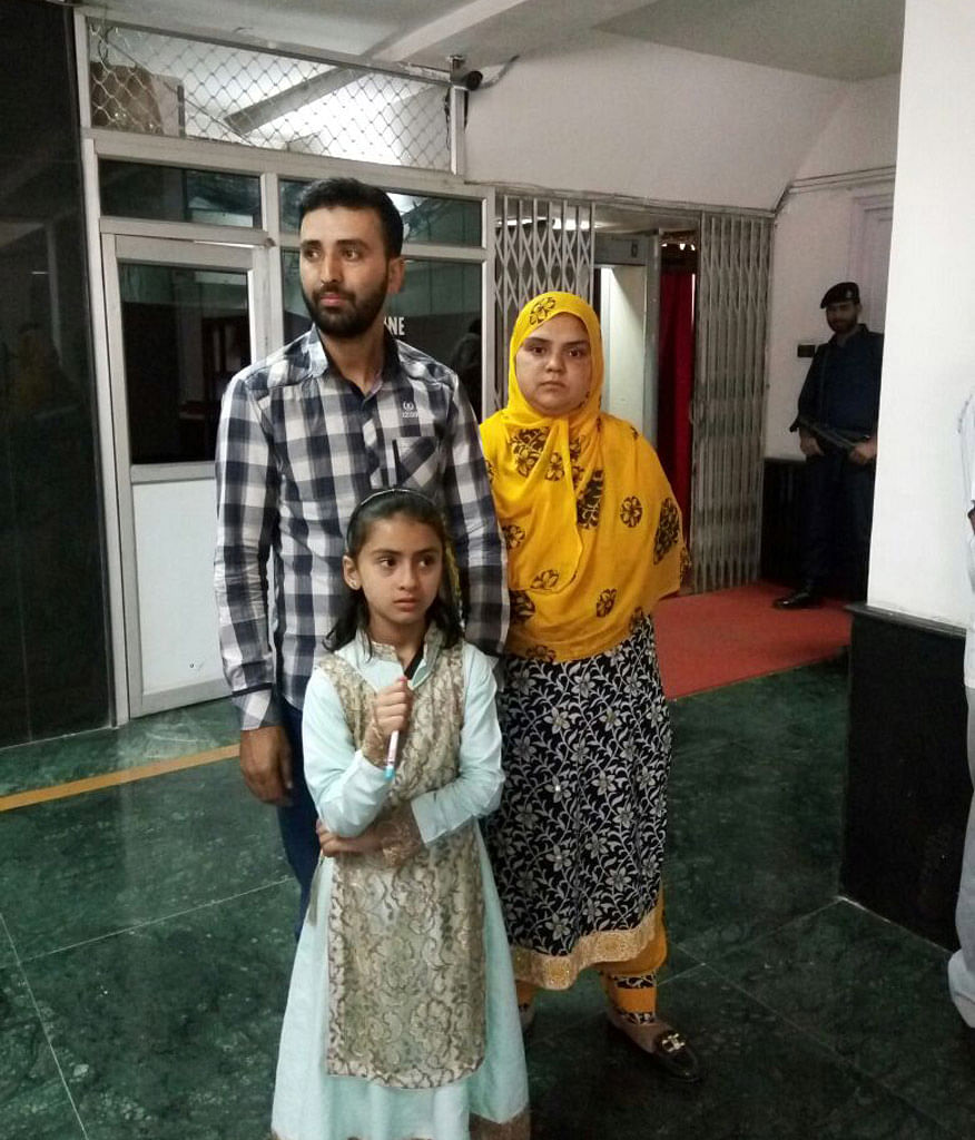 Iram Sayar, married to an ex-militant, is fighting to meet her ailing father in Pakistan occupied Kashmir.