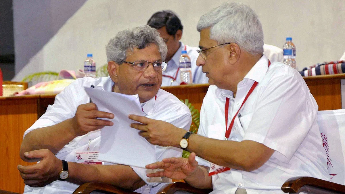 CPI(M) General Secretary Sitaram Yechury with party leader Prakash Karat. (Photo: PTI)