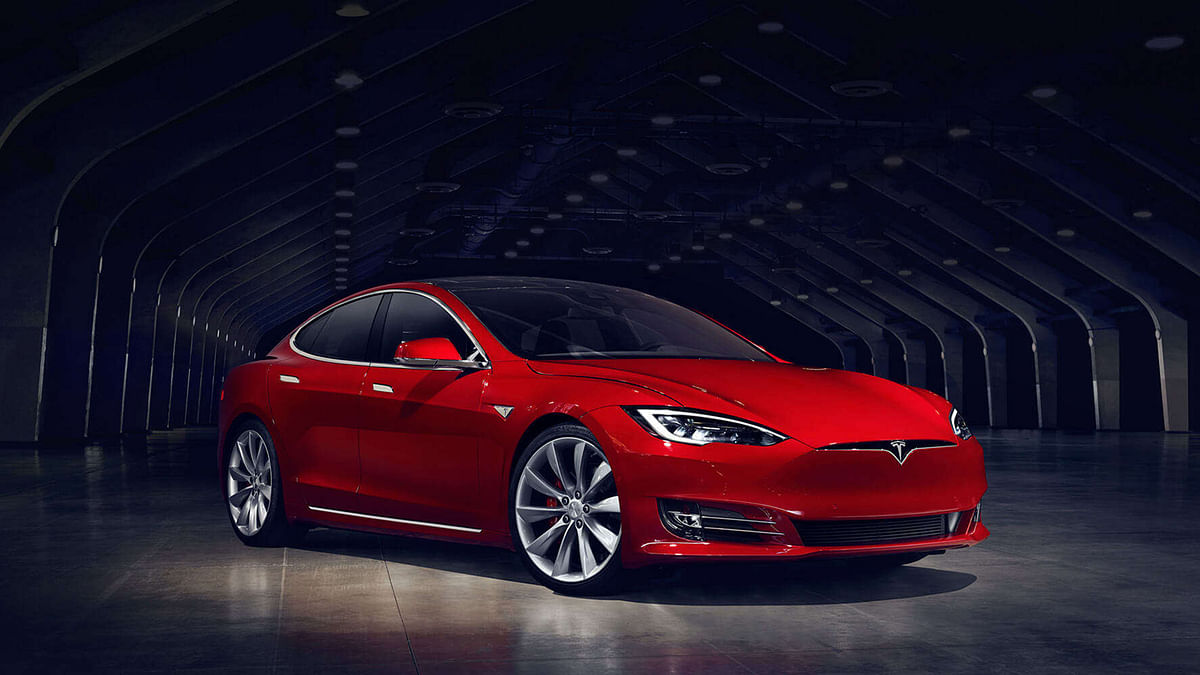 “We’re working on a new Tesla mini-car that can squeeze in an adult,” Musk tweeted on Sunday.