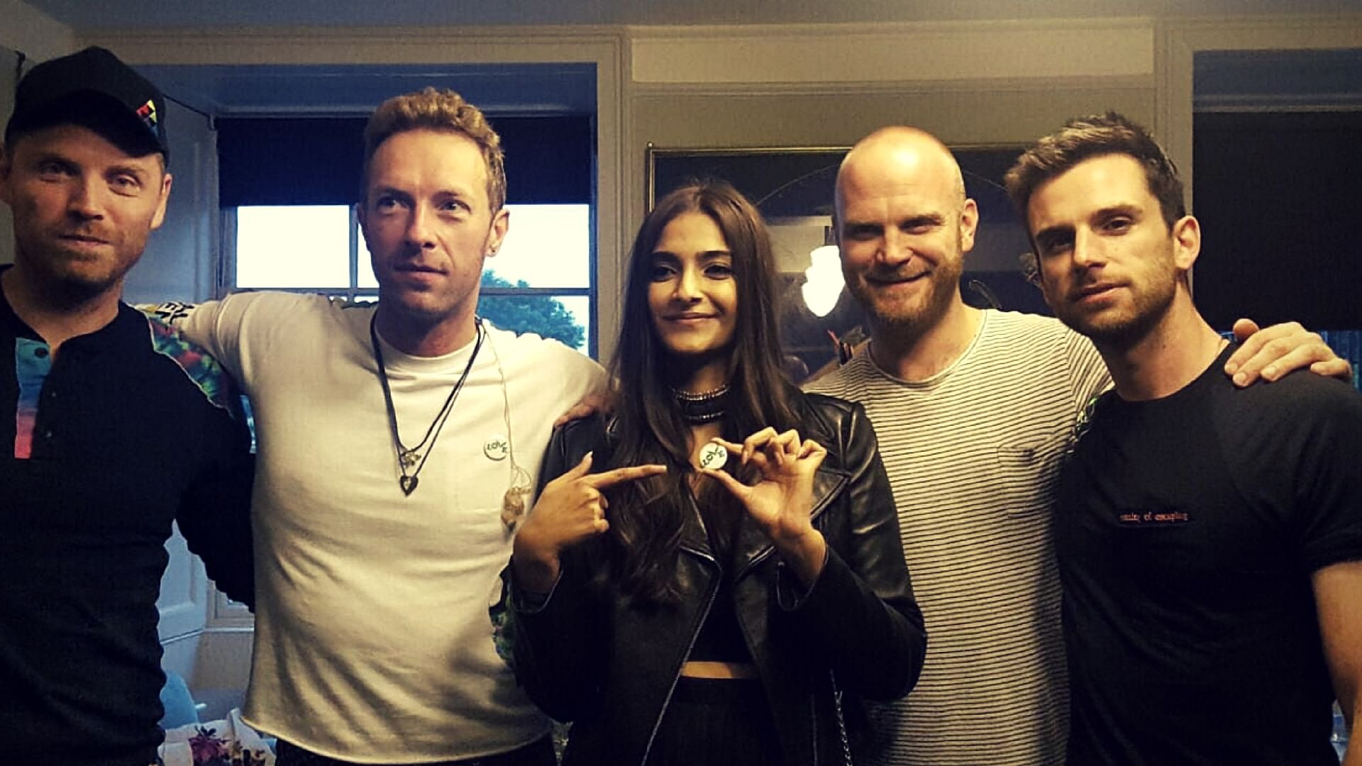 

Sonam Kapoor  with the Coldplay band members in London. (Photo Courtesy: Twitter)