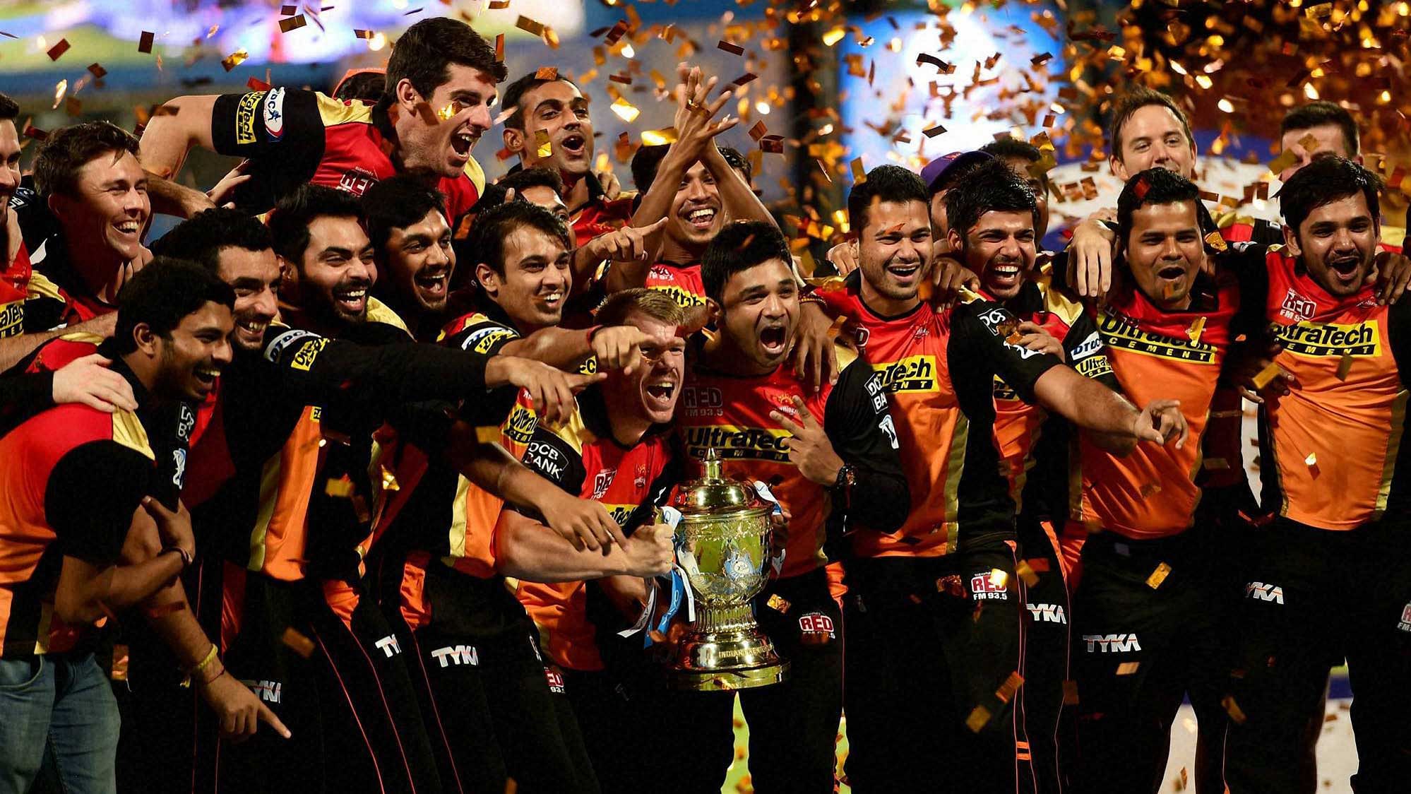 The Sunrisers Hyderabad team celebrate with the IPL trophy. (Photo: IANS)