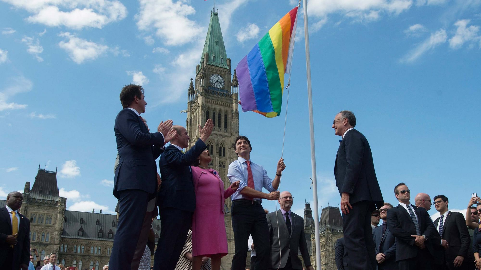 

Justin Trudea hoists the Pride flag at Parliament Hill, Ontario, Canada. (Photo: Reuters)