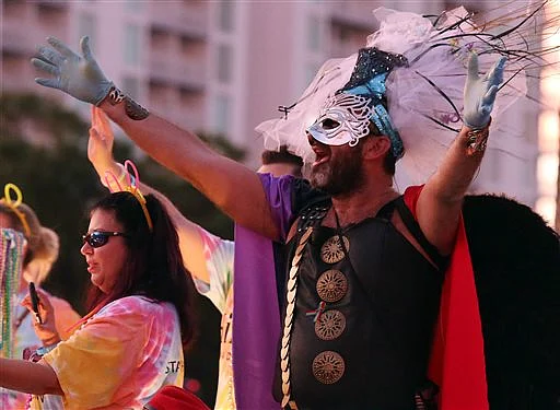 Participants come together in the St. Pete’s Pride Parade. (Photo: AP)