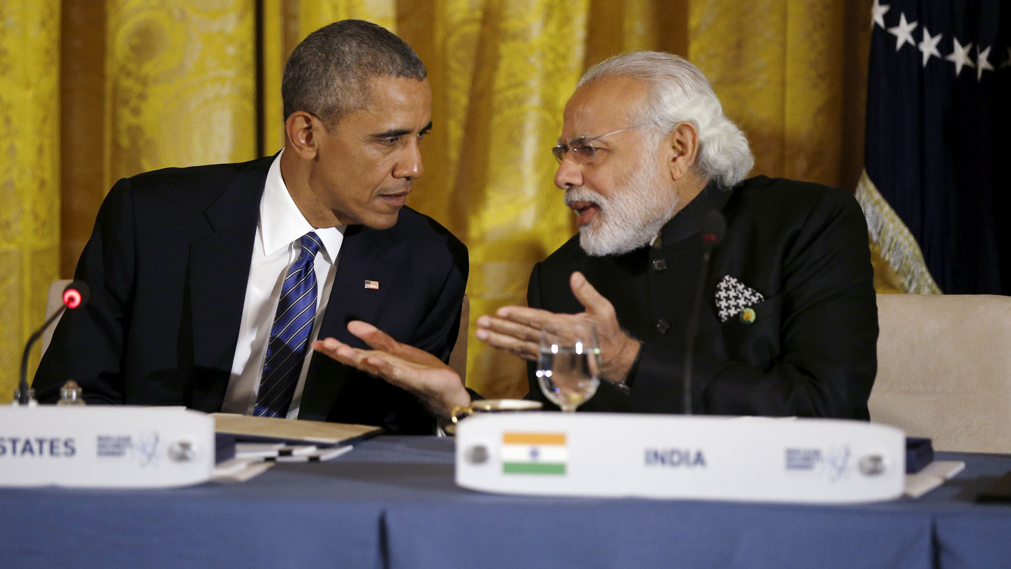 US President Barack Obama talks with Prime Minister Narendra Modi (R) during a working dinner at the White House. (Photo: Reuters)