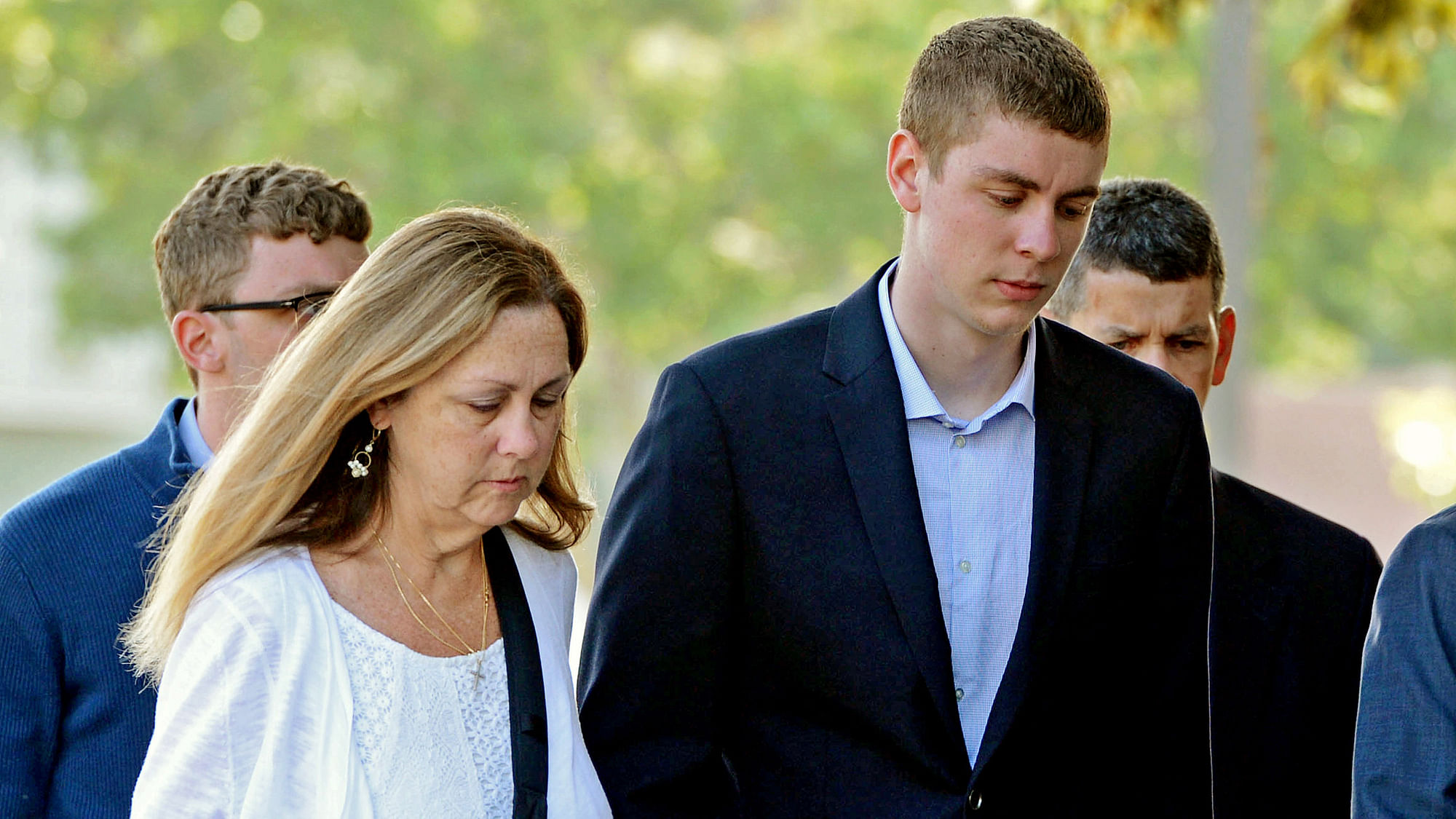 Brock Turner (R) makes his way into the Santa Clara Superior Courthouse in California. (Photo: AP)