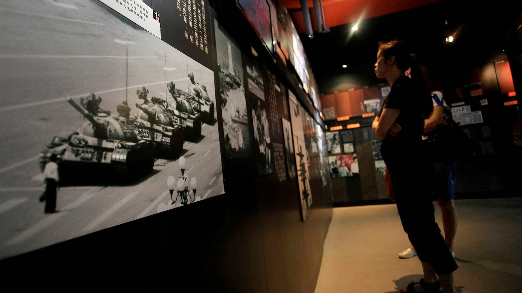 

 A photograph of Tank Man, the lone protester who stood to block the way of a line of several tanks during the 1989 pro-democracy movement in Beijing, is displayed at the June 4th Museum in Hong Kong, Saturday, 4 June 2016. (Photo: PTI)