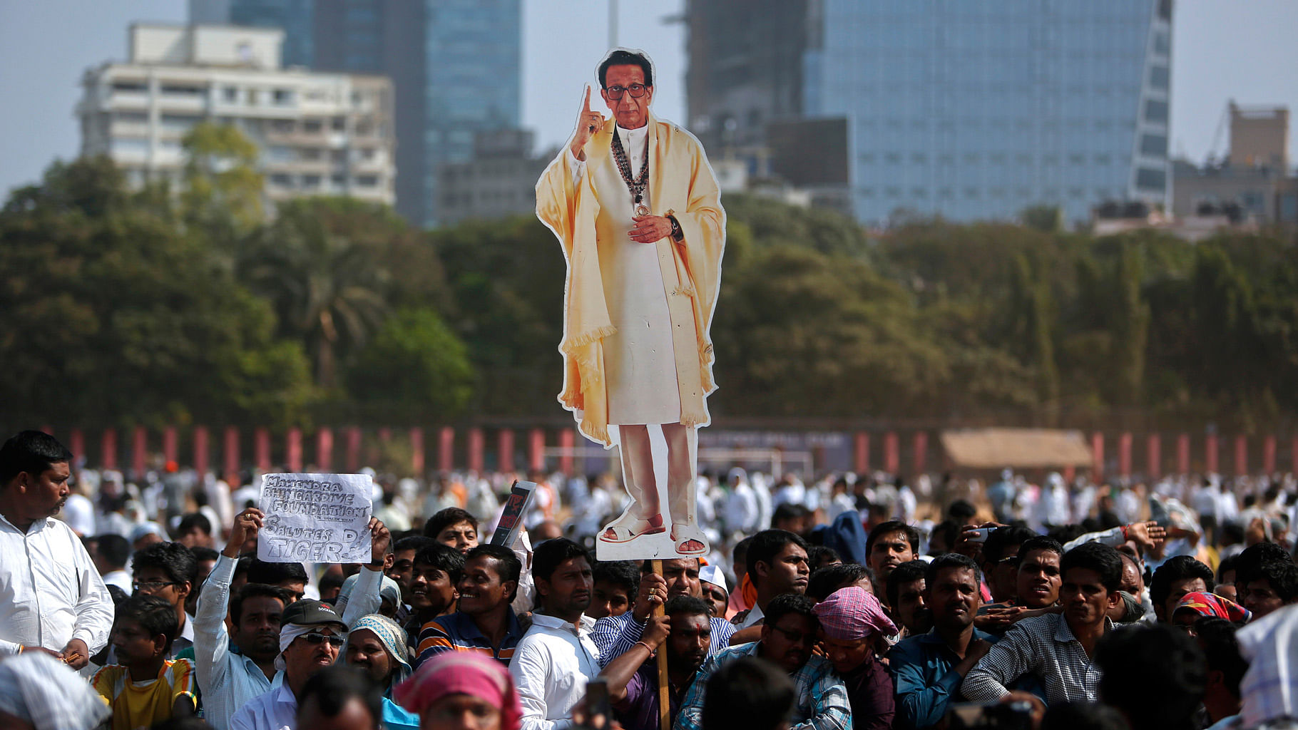 A property dispute broke out after Bal Thackeray died in November 2012. Seen in the picture are supporters carrying his cut-out before his cremation. (Photo: Reuters)