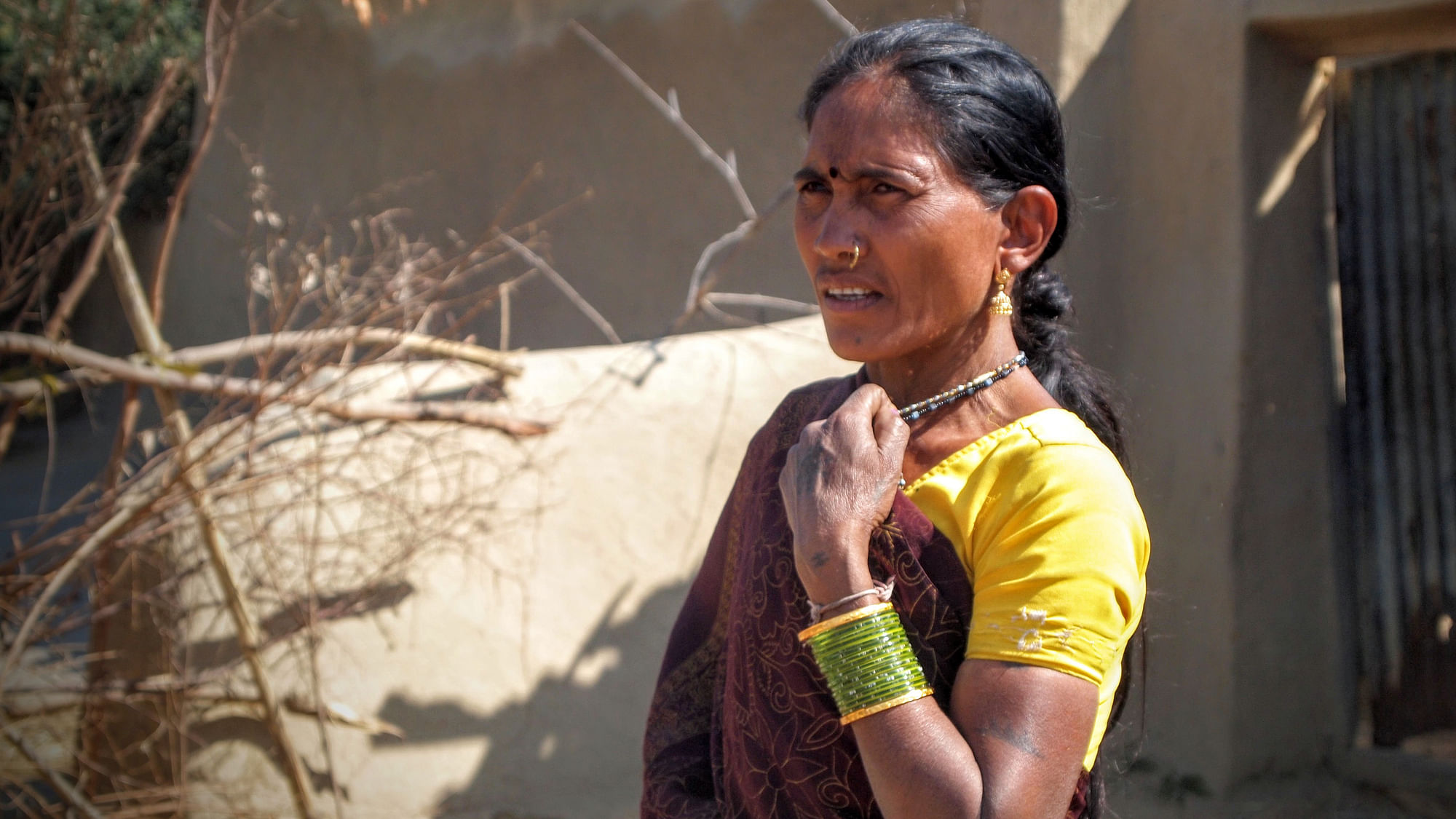 Nirupabai, a Kawar Adivasi woman, has lost everything to the Kusmunda mine. (Photo courtesy: Amnesty International)