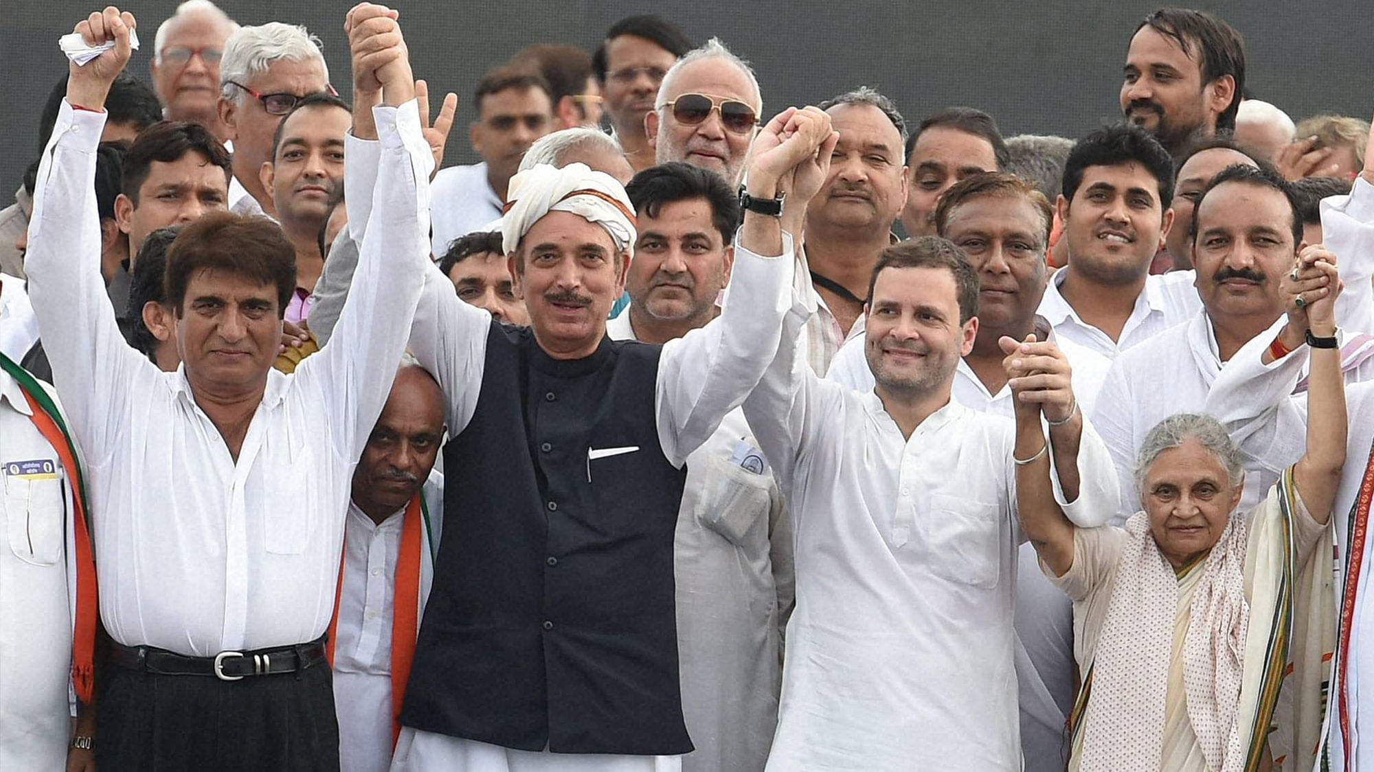 Congress Vice President Rahul Gandhi with UP Congress chief Raj Babbar, senior leader Ghulam Nabi Azad and the party’s CM candidate Sheila Dikshit during a party programme in Lucknow on Friday. (Photo: PTI) 