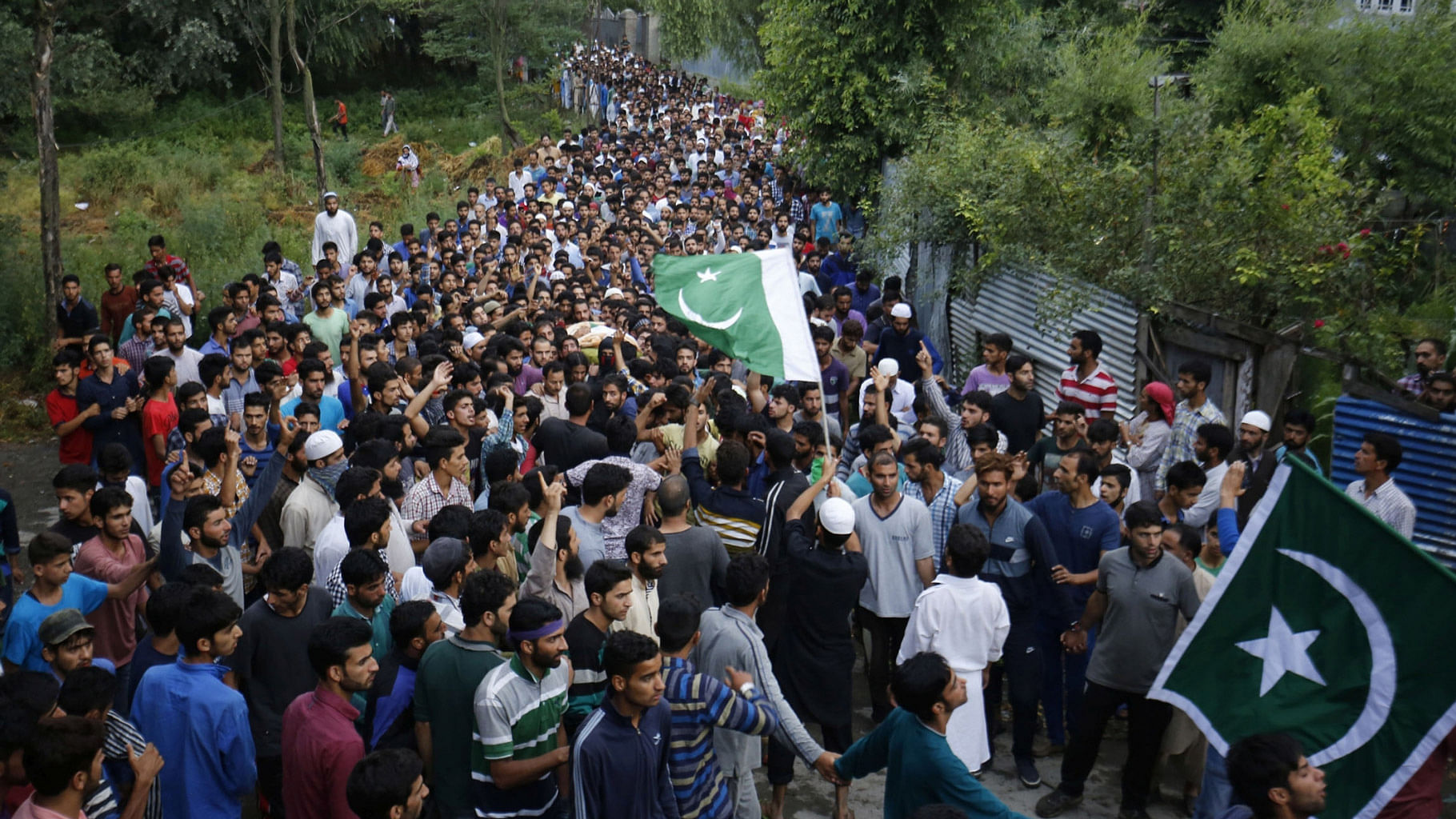 

People attend funeral procession of militant Burhan Wani at his village in Tral of Jammu and Kashmir`s Pulwama district on 9  July  2016. (Photo: IANS)