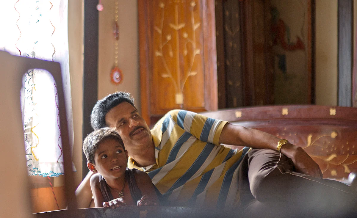 Manoj Bajpayee with Mayur Patole in a still from <i>Bhudhia Singh. </i>( Photo courtesy: Raindrop Media)