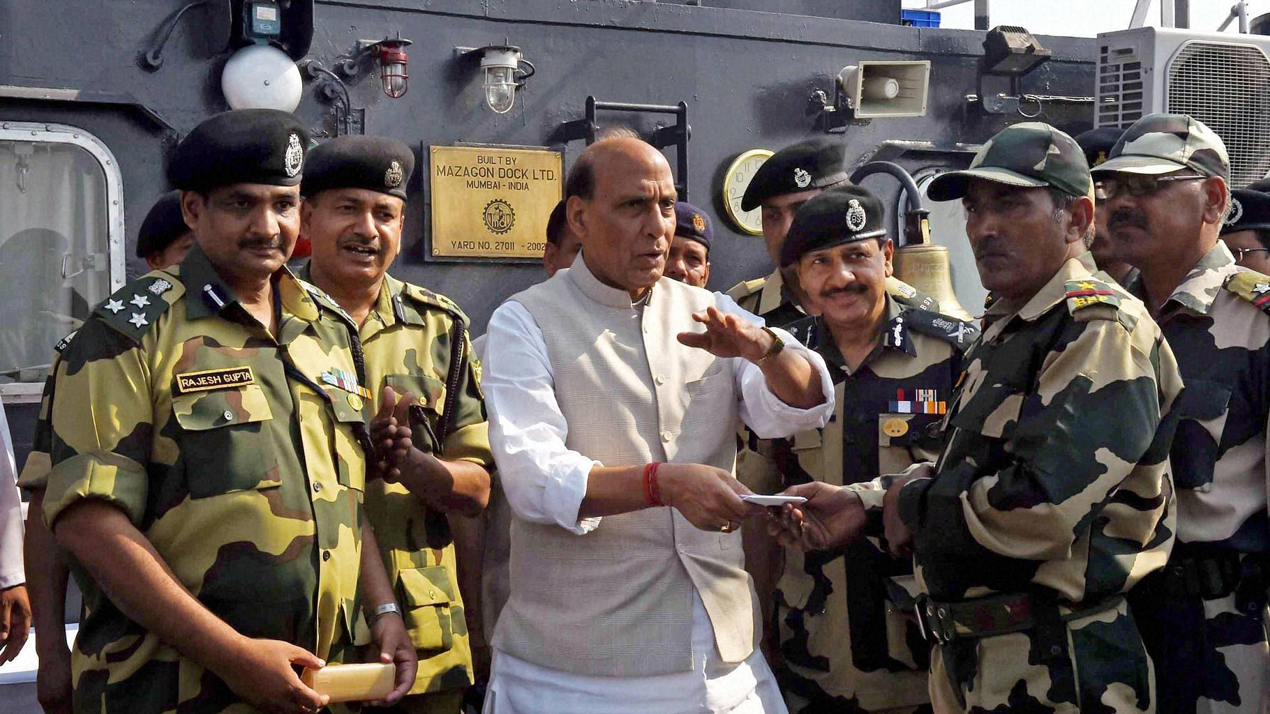 Union Home Minister Rajnath Singh with BSF personnel at a Border Out Post. (Photo: PTI)&nbsp;