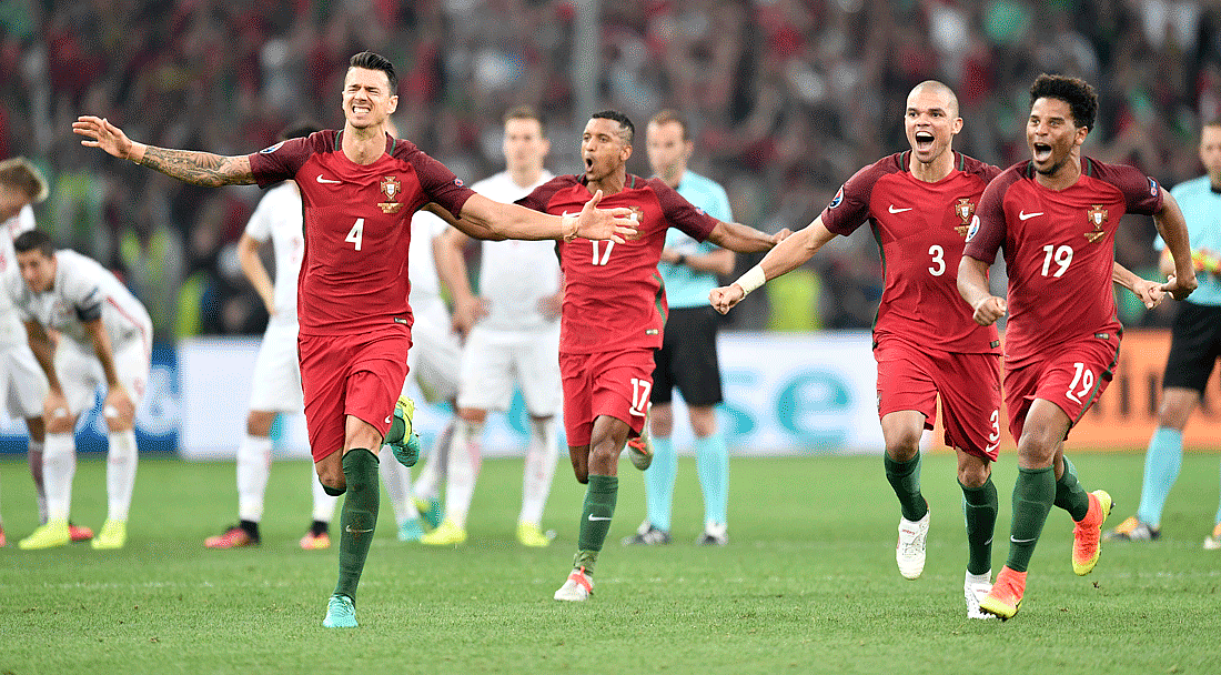 Portugal players, Jose Fonte, Nani, Pepe and Eliseu celebrate after winning the Euro 2016 quarterfinal soccer match. (Photo: AP) 