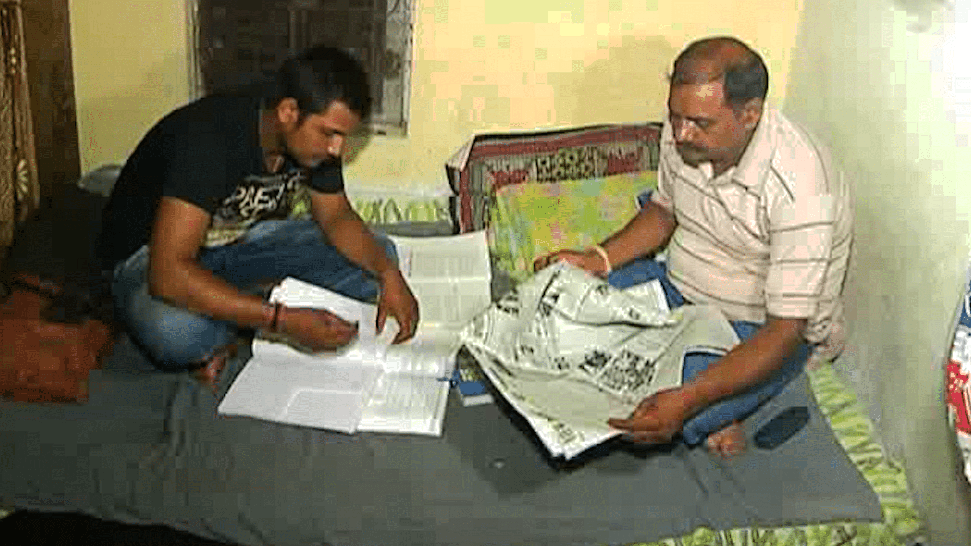 Piyush Meena and his father Phoolchand in Kota’s correction facility. (Photo:<b> The Quint</b>)