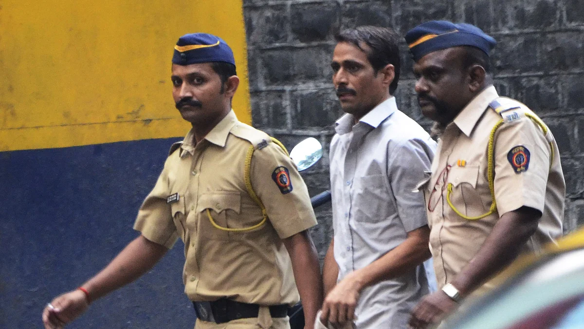 Shyam Manohar Rai, suspect in Sheena Bora murder case produced at a CBI court in Mumbai, on October 27, 2015. (Photo: IANS)