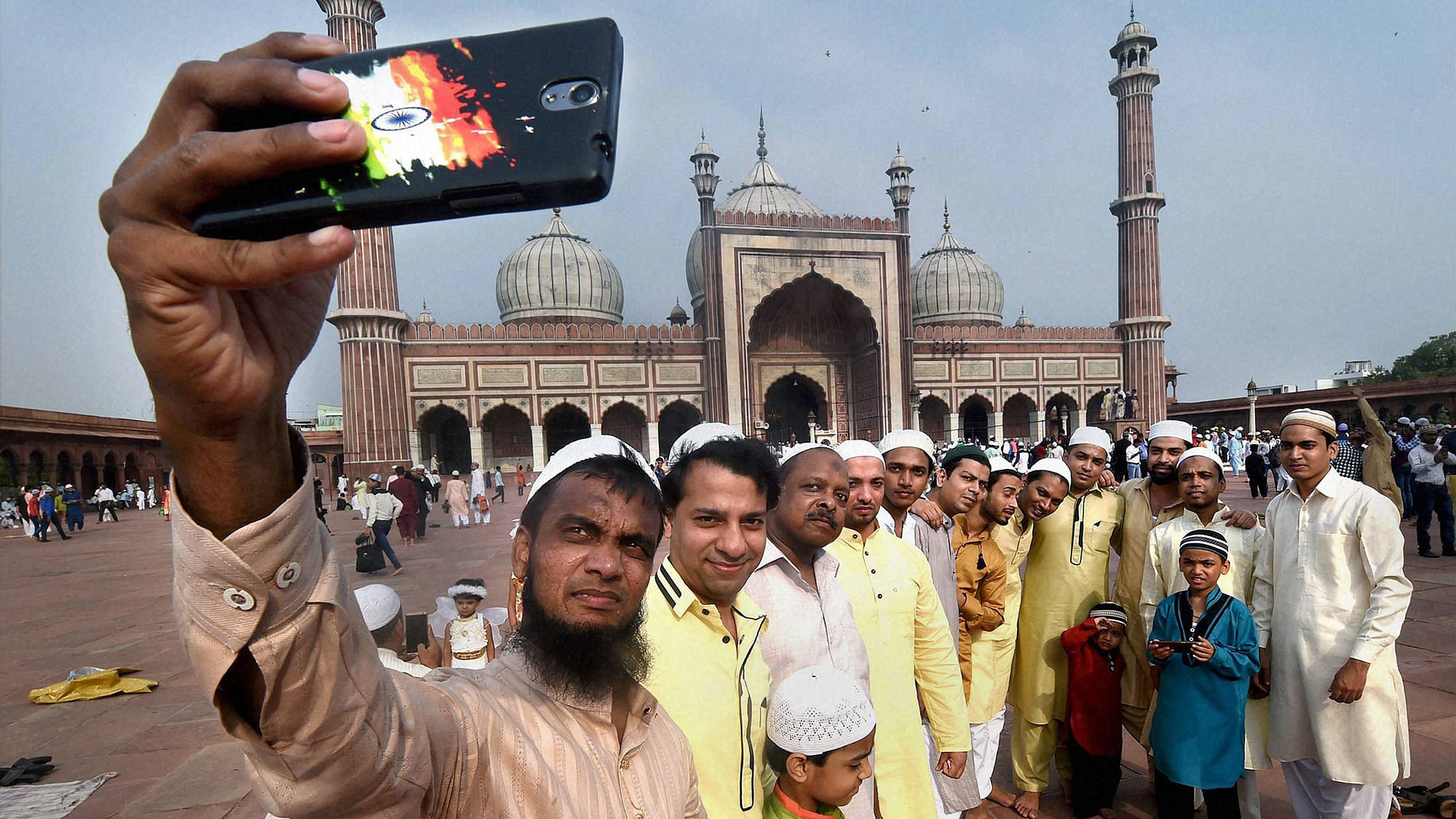 Muslims taking selfie as they celebrate Eid-ul-Fitr at Jama Masjid on the occasion of in New Delhi on Thursday.&nbsp;