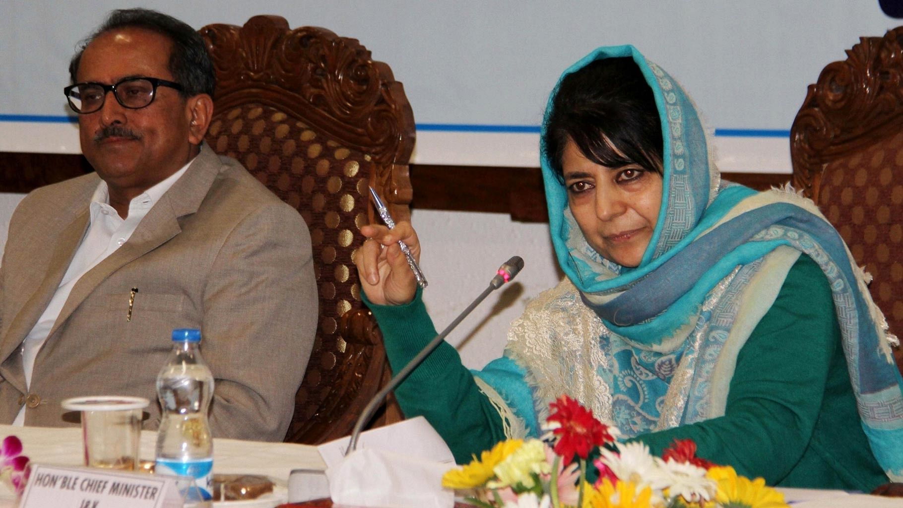 File photo of Chief Minister of Jammu and Kashmir Mehbooba Mufti (right) with Deputy Chief Minister Nirmal Singh. (Photo: IANS)