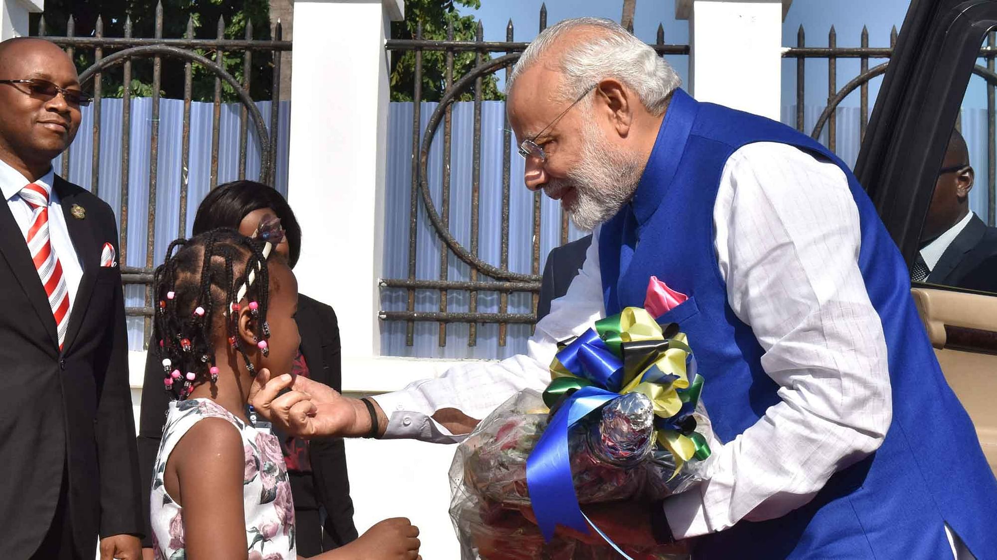 Prime Minister Narendra Modi being greeted by kid, during the ceremonial welcome, at the State House, in Dar-es-Salaam, in  Tanzania. (Photo Courtesy: PIB)