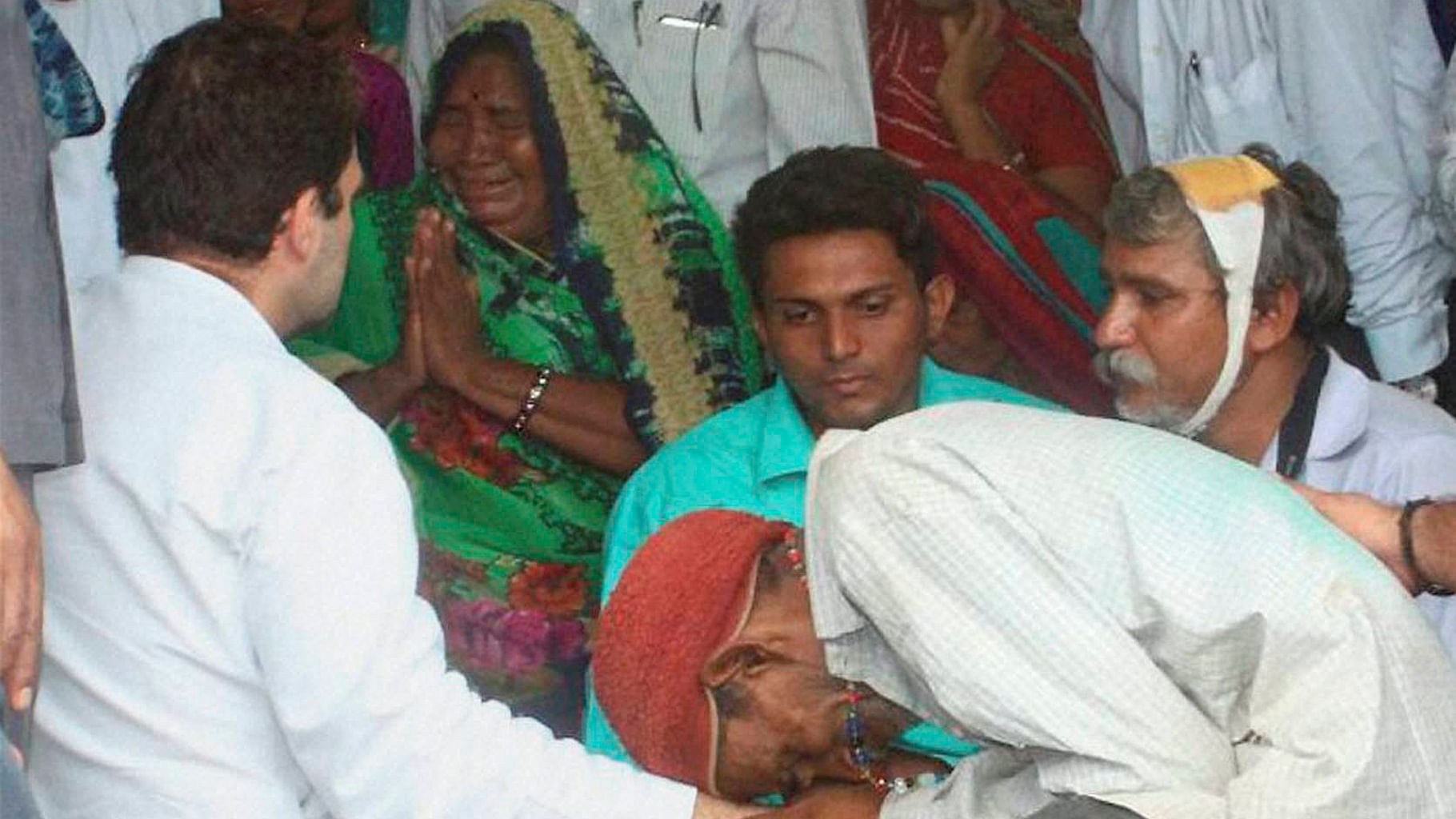 Rahul Gandhi visited the victims of the Una attack where four Dalit men were beaten up by ‘gau rakshaks’ for skinning a dead cow. (Photo: PTI)