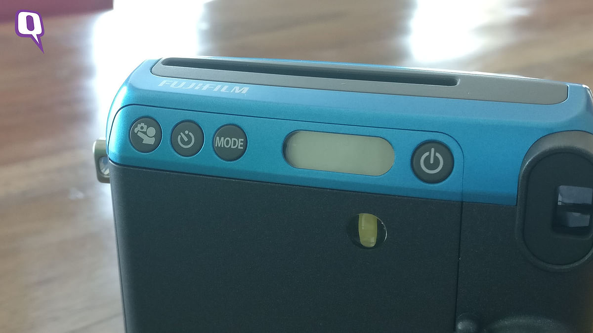 This  polaroid  camera takes us back to the days when phones were merely used for calling.