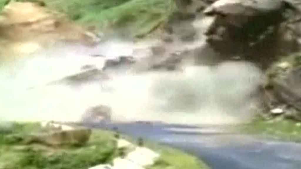 A big chunk of the hill can be seen falling into the Bhagirathi river (Photo: ANI)