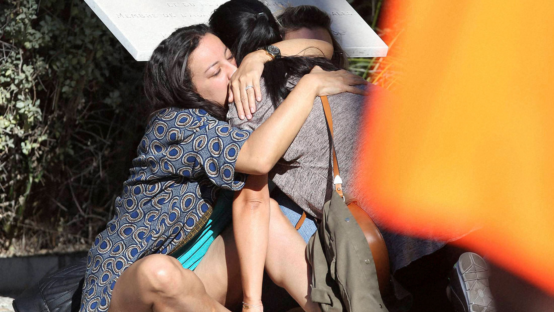 Parents of victims embrace each other near the scene of a truck attack  in Nice, southern France, Friday, July 15, 2016. (Photo Courtesy: PTI)&nbsp;