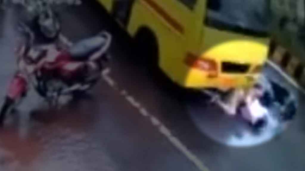 A two-wheeler collided with a bus in Gwalior, Madhya Pradesh which was caught on a CCTV camera. (Photo: ANI screengrab)